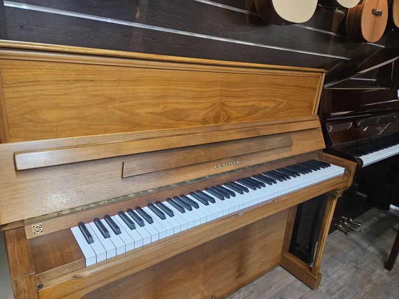 Piano droit Seiler modèle 122 noyer d'occasion à Montpellier