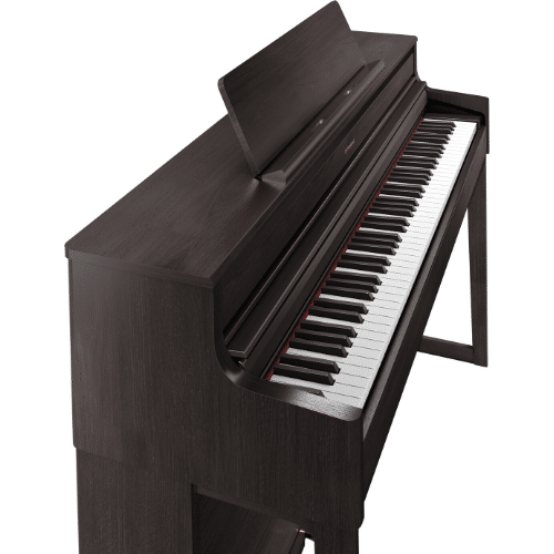 Piano numérique Roland modèle HP704 couleur bois de rose avec possibilité de financement