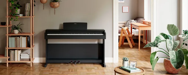 Piano numérique meublé Yamaha Arius modèle YDP 145 avec livraison à Perpignan