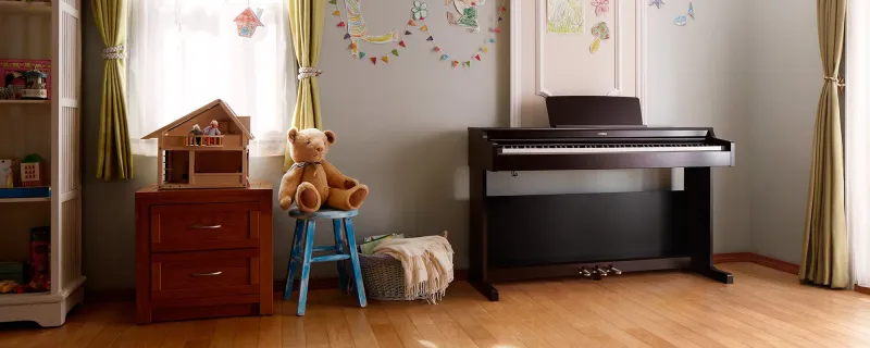Piano numérique meublé Yamaha Arius modèle YDP 165 bois de rose